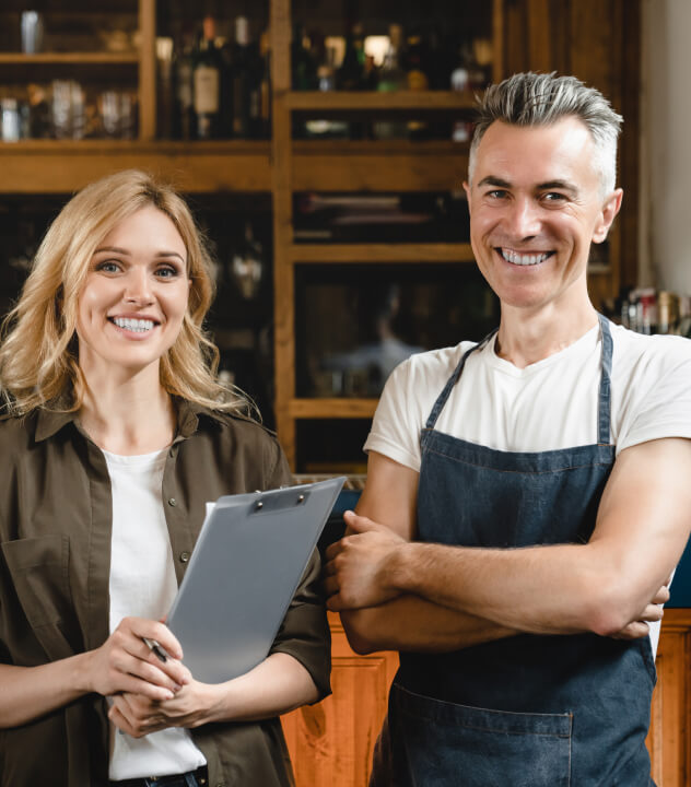 business owner and advisor smiling for portrait